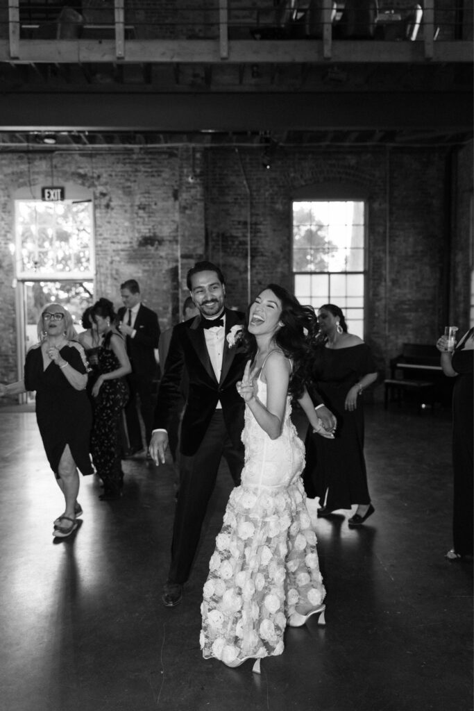 Bride and groom celebrating with loved ones.