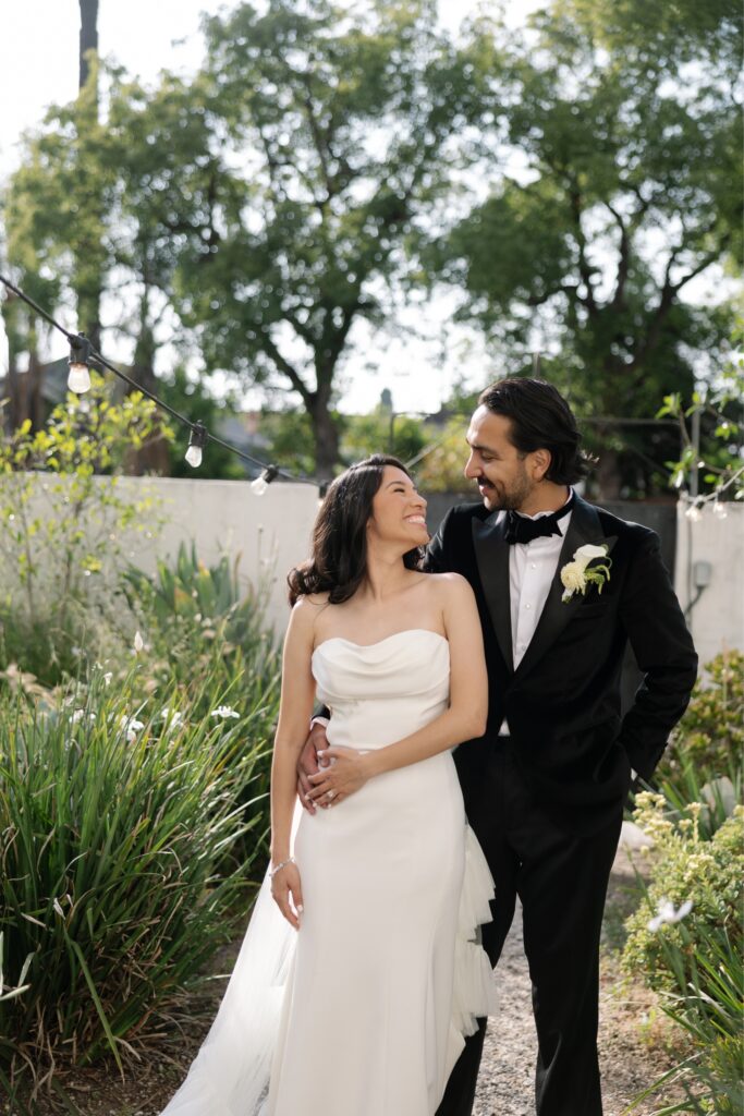 Bride and groom sharing a quiet moment after their ceremony.