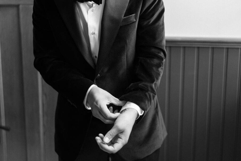 Groom getting ready before his wedding at The Huron Substation.