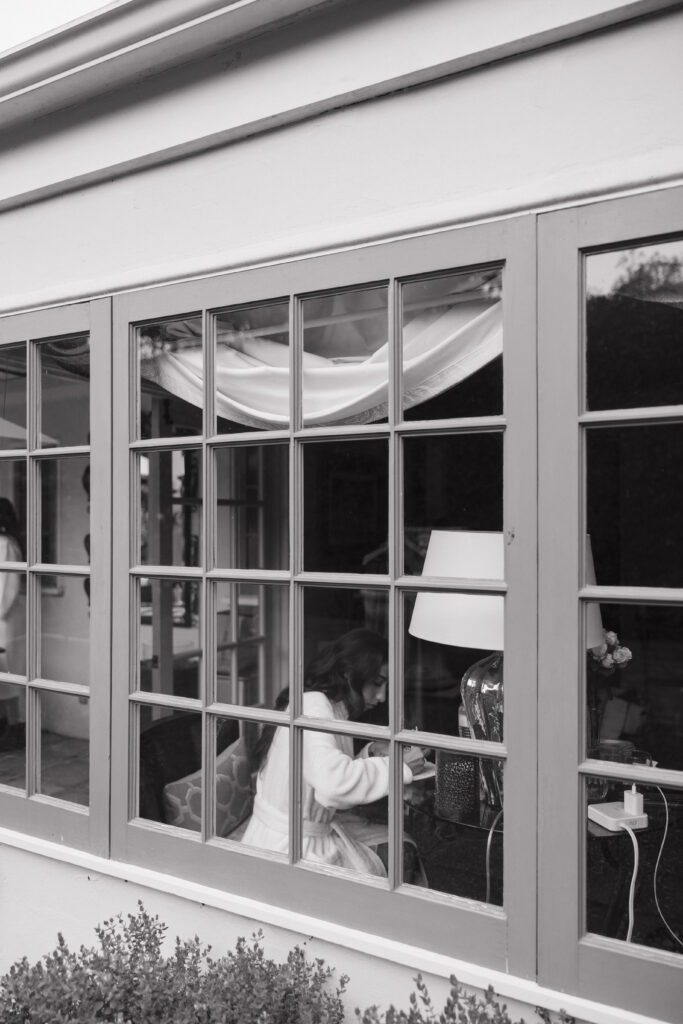 Bride writing her vows before the ceremony.