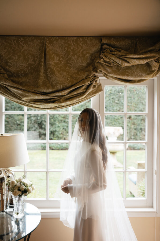 Bride getting ready before her Santa Barbara Courthouse wedding.