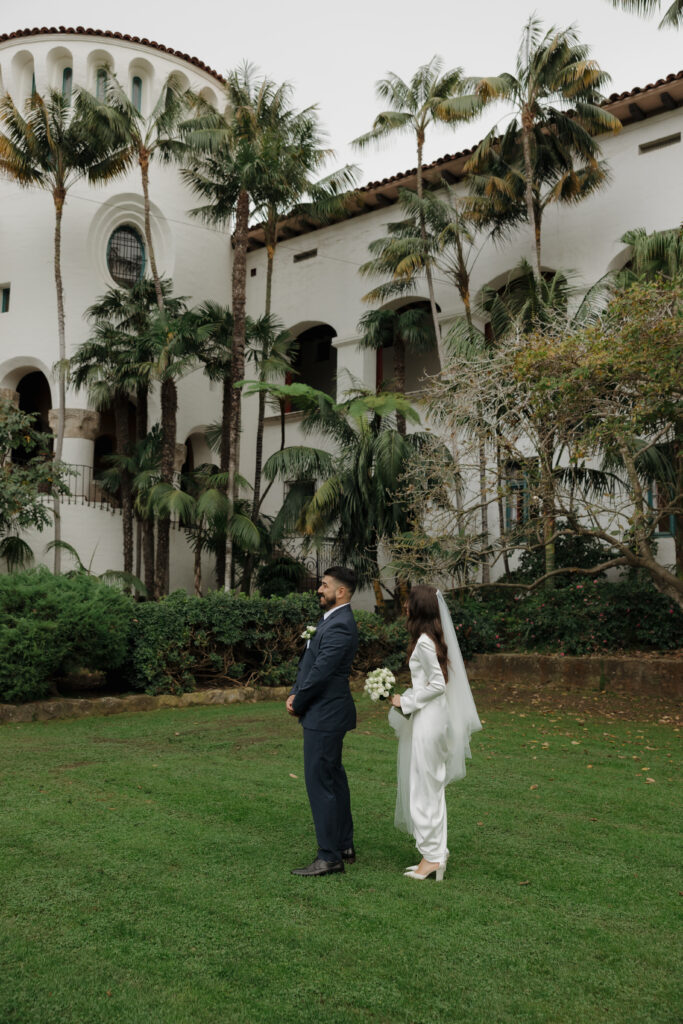 Bride and groom sharing their first look.