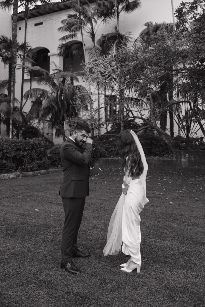 Bride and groom sharing their first look.