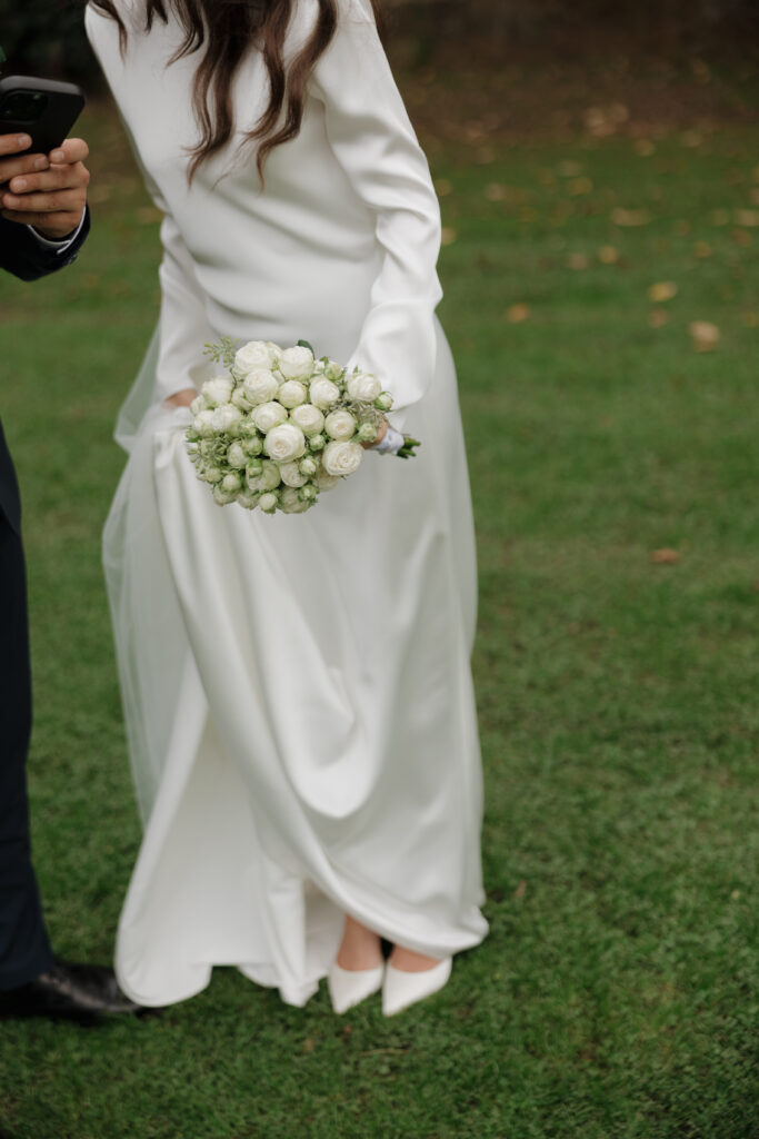 Bride and groom sharing a quiet moment before saying "I do."