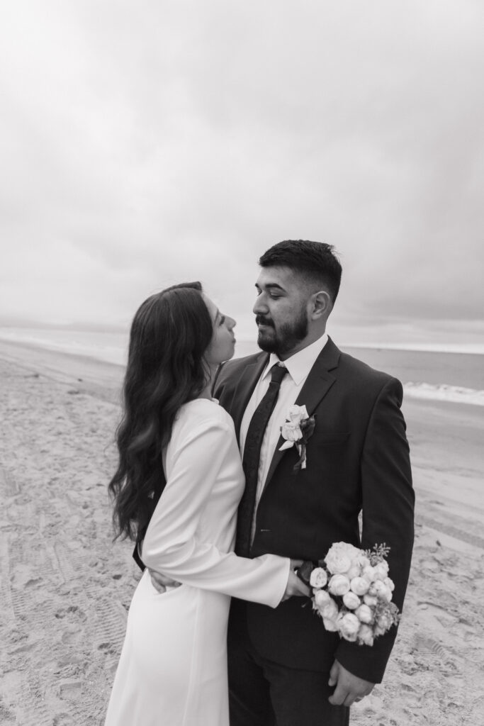 Newlyweds celebrating at the end of their wedding day.
